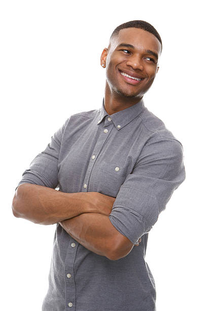 istock Handsome black man smiling with arms crossed 522799041