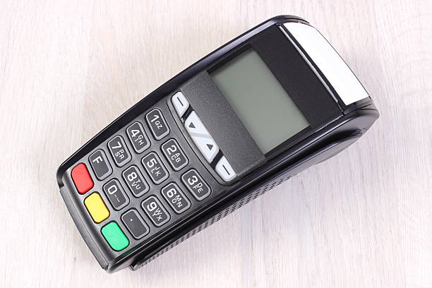 istock Payment terminal, credit card reader, cashless paying for shopping 522800236