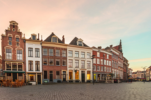 Ancient row of houses in the historic Dutch city of Zutphen during sunset