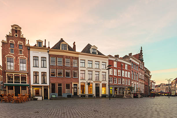 Ancient houses in the historic Dutch city of Zutphen Ancient row of houses in the historic Dutch city of Zutphen during sunset gelderland photos stock pictures, royalty-free photos & images
