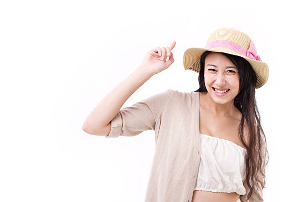 istock smiling happy woman pointing up 522802078