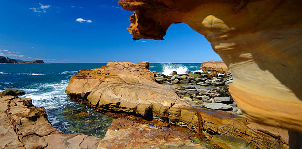 Avoca Beach Rock shelf Avoca Beach is a coastal suburb of the Central Coast region of New South Wales, Australia, about 95 kilometres north of Sydney. Avoca Beach is primarily a residential suburb but also a popular tourist destination. avoca beach photos stock pictures, royalty-free photos & images