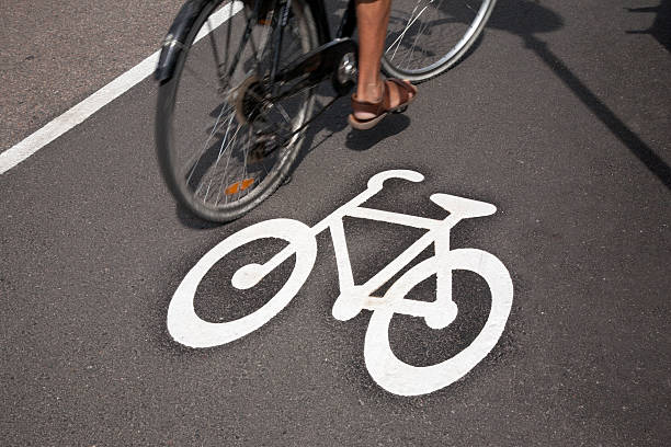 istock Bicycle Symbol on Cycle Lane with Cyclist in Helsinki 522802807