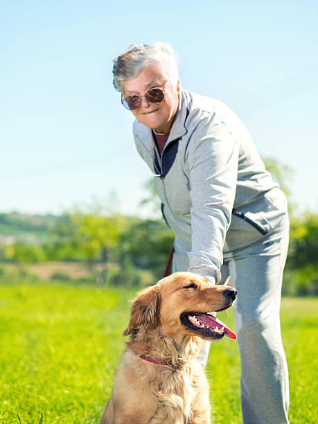 istock Senior woman and her dog 522803404