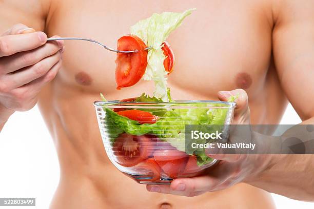 Young Man With Perfect Body Holds Salad Stock Photo - Download Image Now - Adult, Adults Only, Anaerobic Exercise