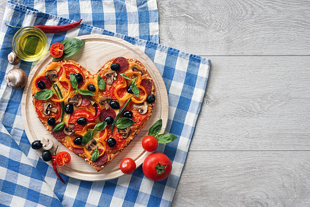 istock Delicious pizza served on white wooden table. 522803860