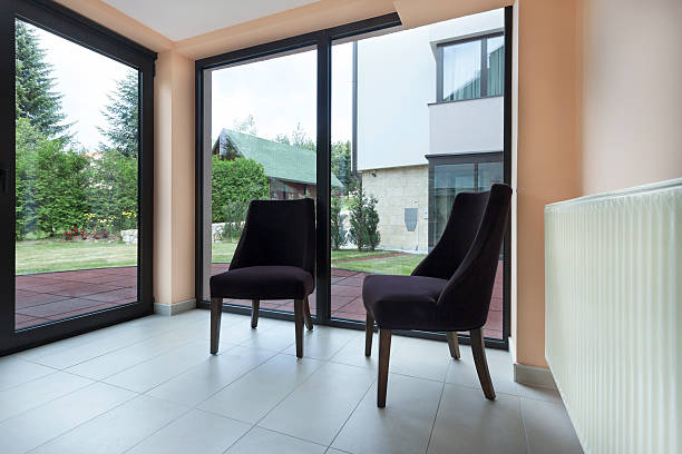 istock Two chairs in a room with big windows 522804207
