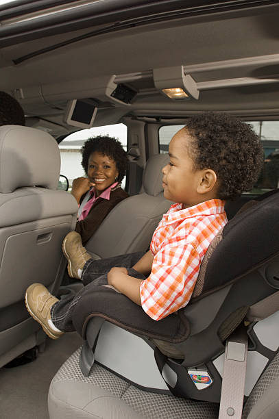istock Boy Sitting in Car Seat 522804453