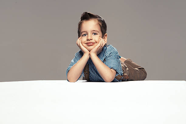 istock Little boy lying on the floor 522805835