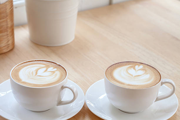 istock Latte Coffee art on the wooden table 522806150