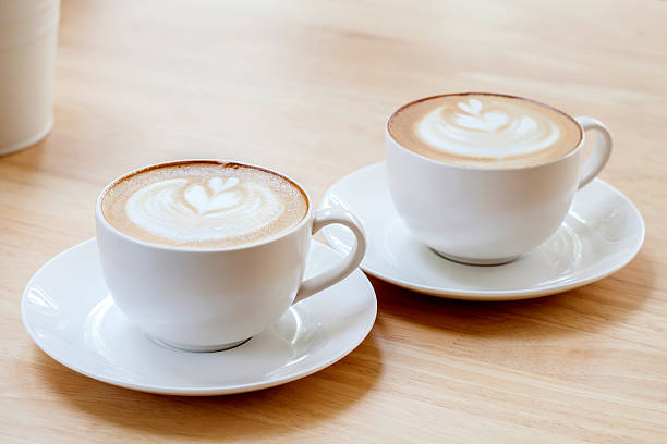 istock Latte Coffee art on the wooden table 522806214