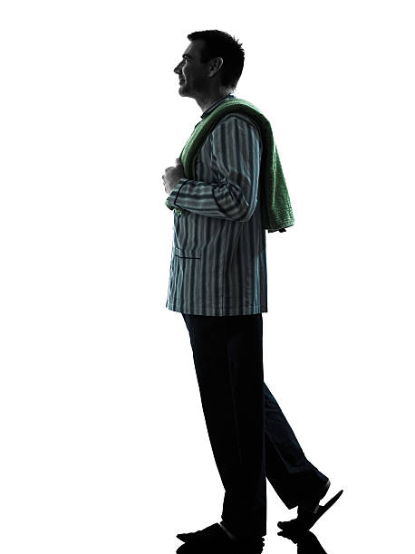 istock man  pajamas morning grooming  silhouettes 522814651