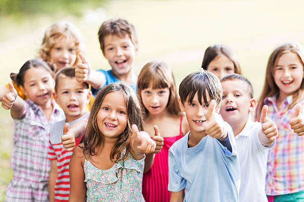 istock Children showing thumbs up. 522816887