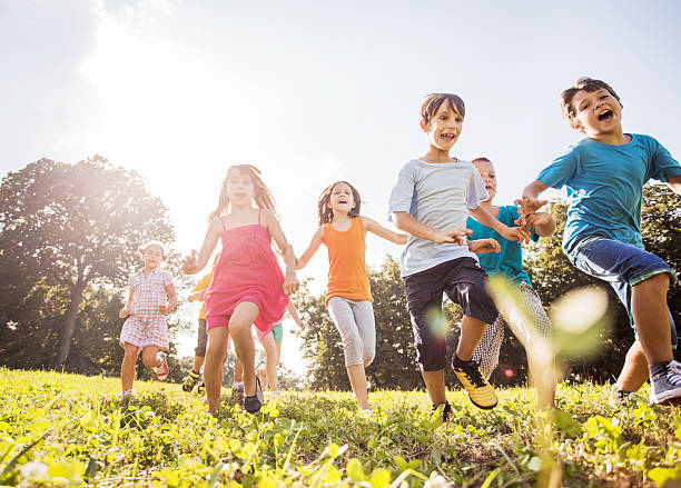 istock Children having fun in the park. 522816895
