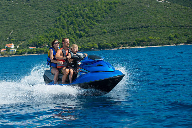 istock Family Riding A Jet Boat 522819801
