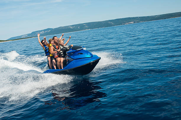 istock Family Riding A Jet Boat 522820787