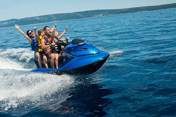 istock Family Riding A Jet Boat 522820801