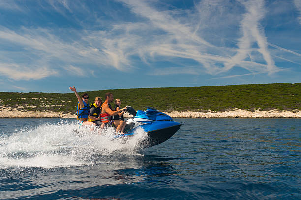istock Family Riding A Jet Boat 522831915