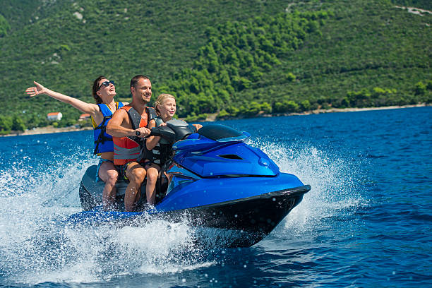 istock Family Riding A Jet Boat 522831935