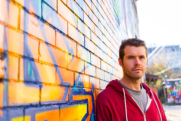 istock Man outside down an urban street 522833611