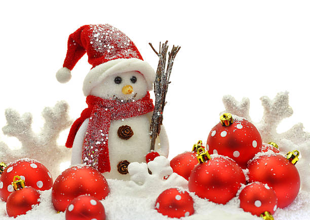 istock Snowman and Christmas ornaments on snow 522834179