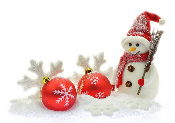 istock Snowman and Christmas ornaments on snow 522834735