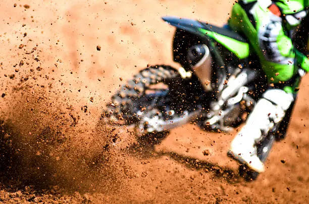 Motocross Biker acellerating during a race