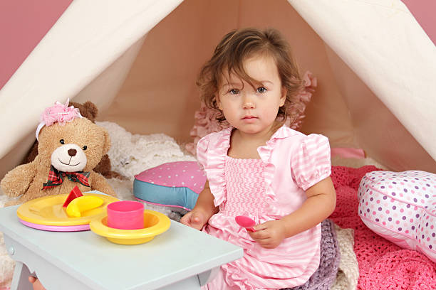 istock Pretend Play Tea Party at home with a TeePee Tent 522836873