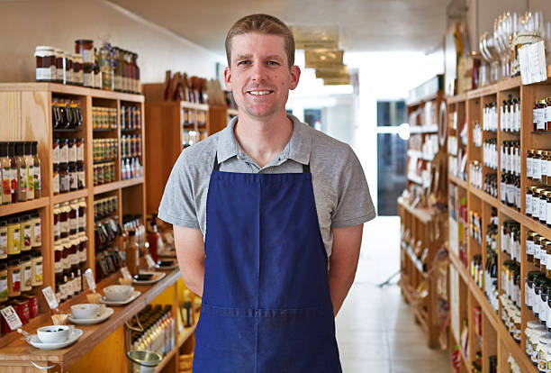 istock Proud shop keeper in delicatessen 522837373