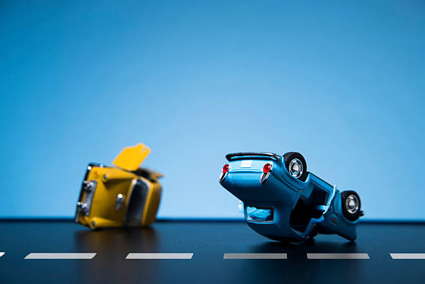 Traffic Accident Classic fifties scale model toy cars accident on the road. toy vehicle stock pictures, royalty-free photos & images