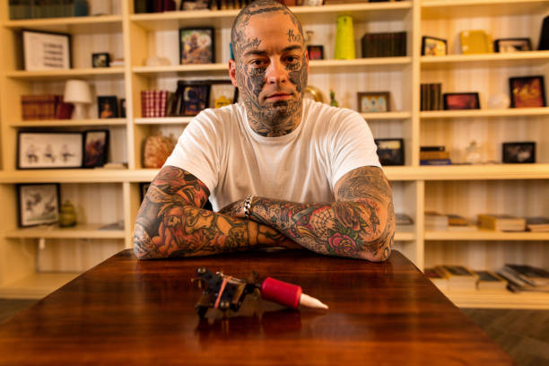 istock Tattoo artist at home looking at camera. 522847904