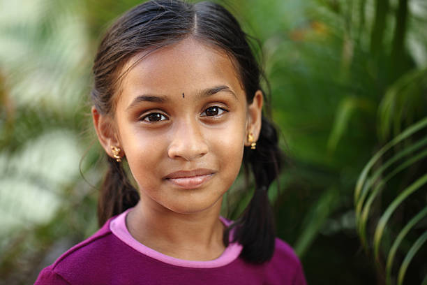 istock Attractive cute little girl posing to camera 522849112