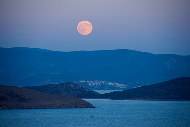 istock romantic moonlit night over the sea 522850476