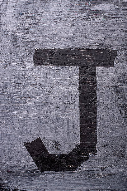 istock Black grunge alphabet. Letter J 522850984