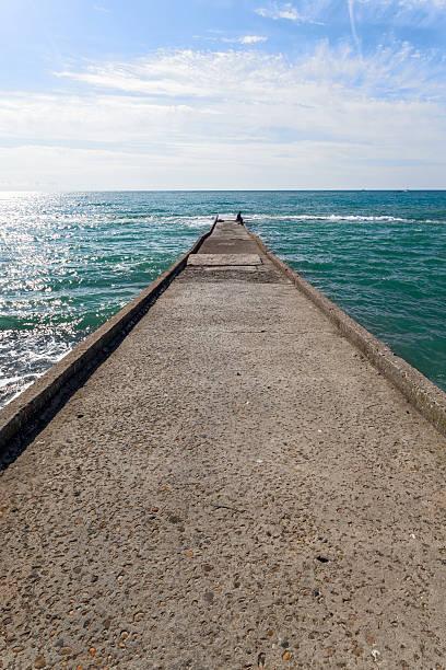 istock Pierce and lone fisherman. 522851093