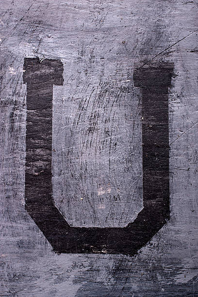 istock Black grunge alphabet. Letter U 522851854