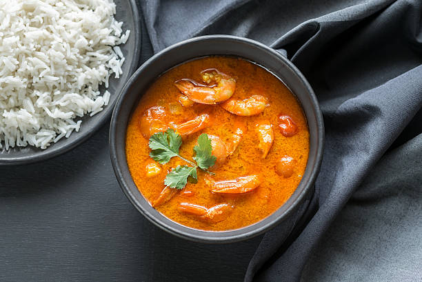 istock Thai yellow curry with seafood and white rice 522852312