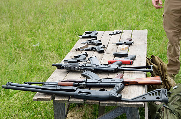 istock Firearm on the table outdoors 522852465