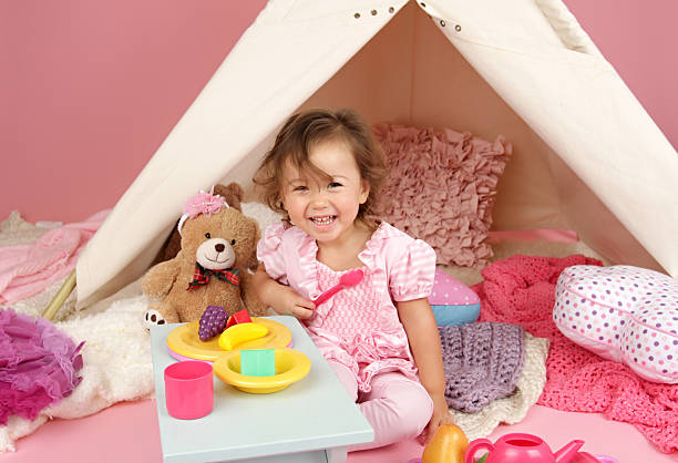 istock Pretend Play Tea Party at home with a TeePee Tent 522852621