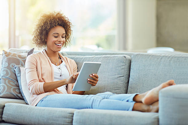 istock Downloading an ebook from her favorite author 522853726