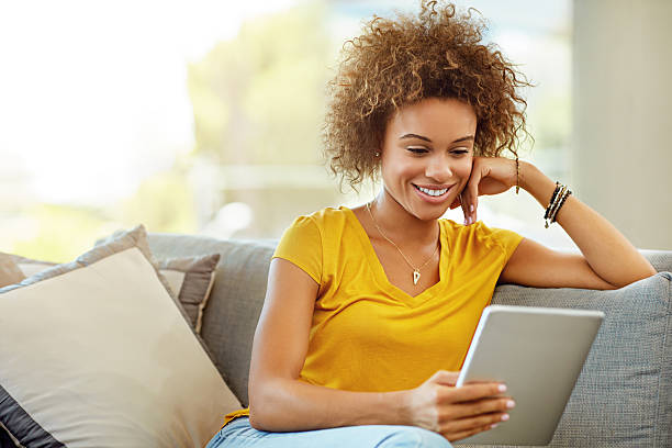istock Her favourite online magazine keeps her entertained for hours 522853848