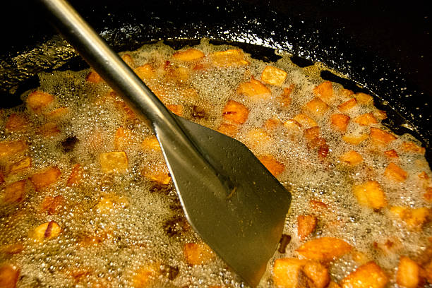 istock Cracklings cooking in iron kettle 522854187
