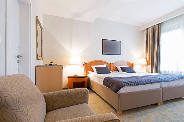 istock Interior of a double bed hotel room 522857536