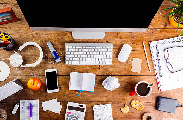 istock Desk with various gadgets and office supplies. Flat lay 522860716