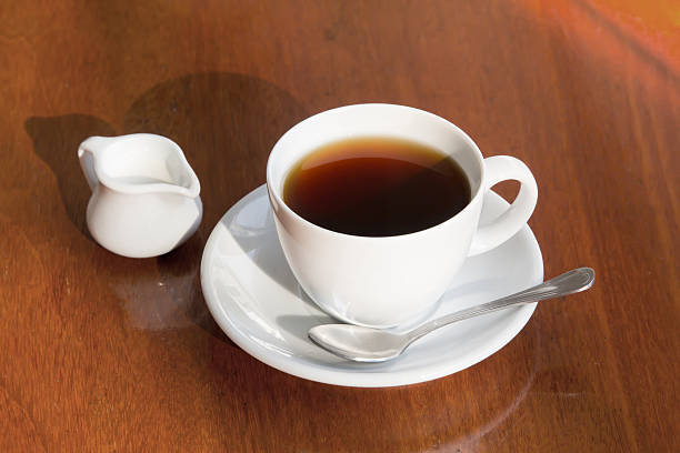 istock milk and a cup of black coffee 522861926