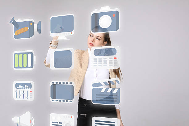 istock Woman pressing high tech type of modern multimedia buttons on 522862274