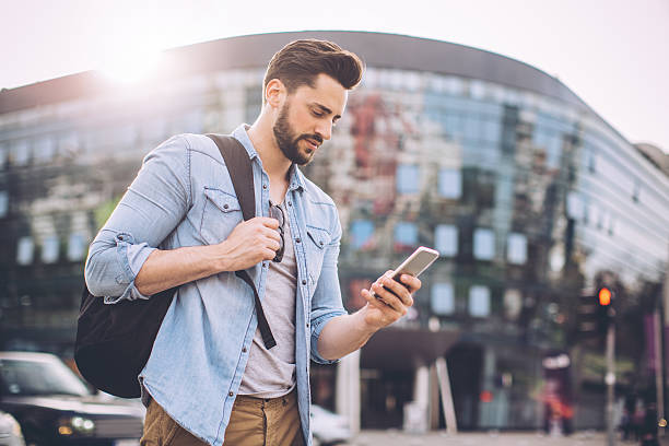istock Young man waiting for taxi 522864534