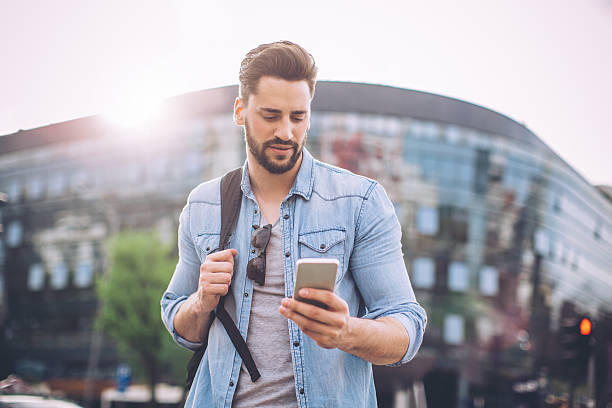 istock Young man waiting for taxi 522864646