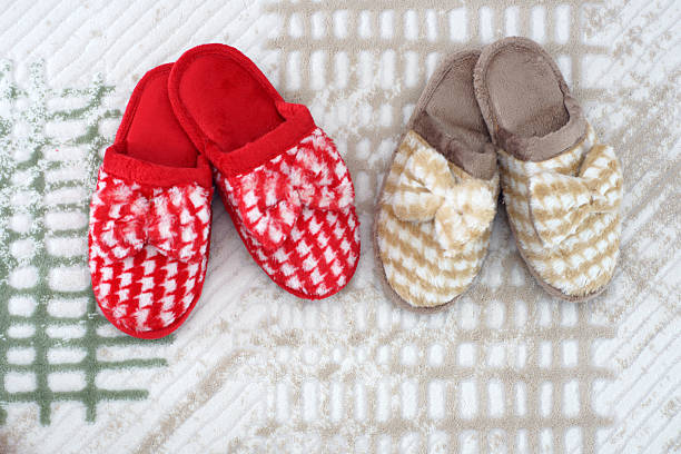 istock Slippers and carpet close-up 522864902