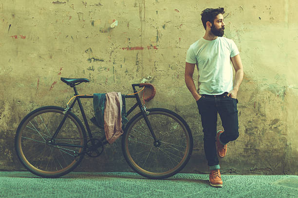 Hipster guy with bicycle in Italy Hipster guy with bicycle in Italy racing bicycle photos stock pictures, royalty-free photos & images